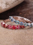 pear and round cut gemstone stacking rings in 18ct gold