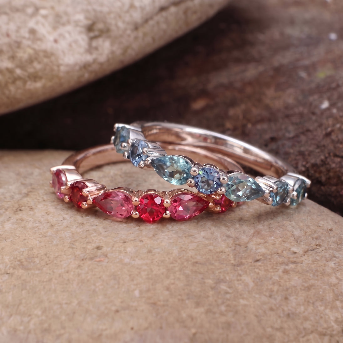 pear and round cut gemstone stacking rings in 18ct gold